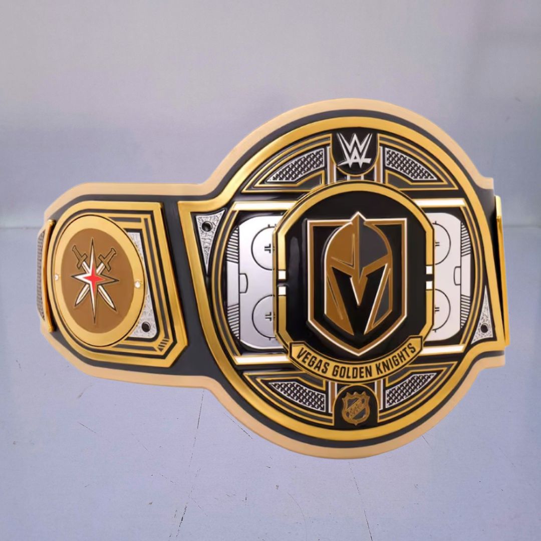 Close-up of the Vegas Golden Knights WWE NHL Championship Belt, showcasing team colors and logo.